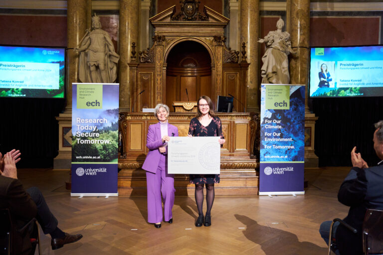 Tatiana Konrad receiving the Environment and Climate Research Award 2024
